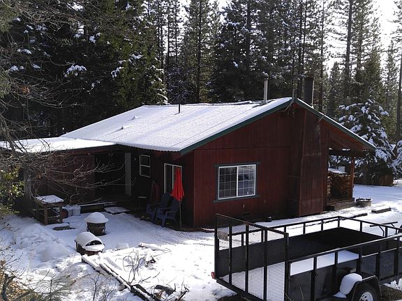Storage shed directly off back deck with barn doors - great for storing ATVs. 

This is a great little area for Bar-b-Quing and sitting around the firepit