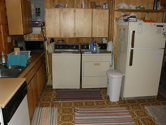 Looking at kitchen area