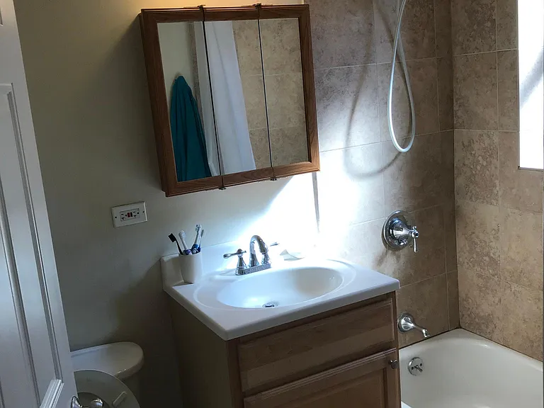 Bathroom with stone tile