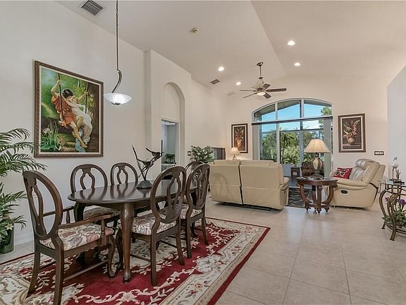Popular Great Room floor plan with high ceilings and tile floors