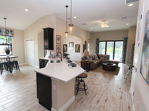 Sweetwater new model home open and airy great room and floor plan William Ryan Homes Tampa