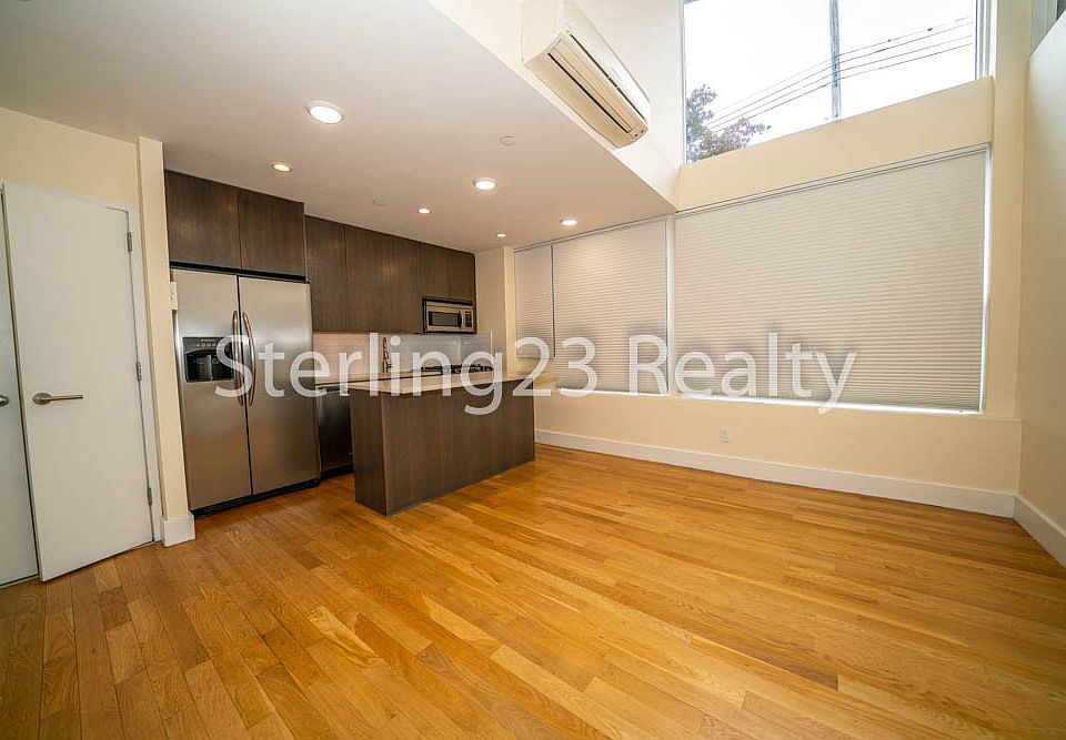 1st image of 11-42 31st Ave #1