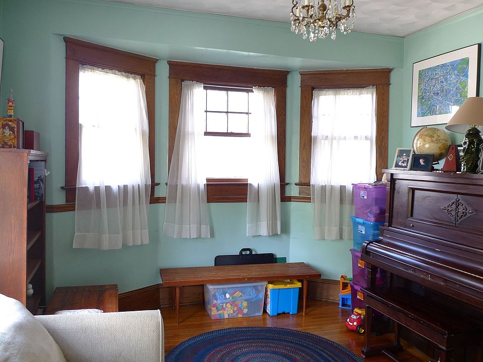 Formal dining/family room with bay window