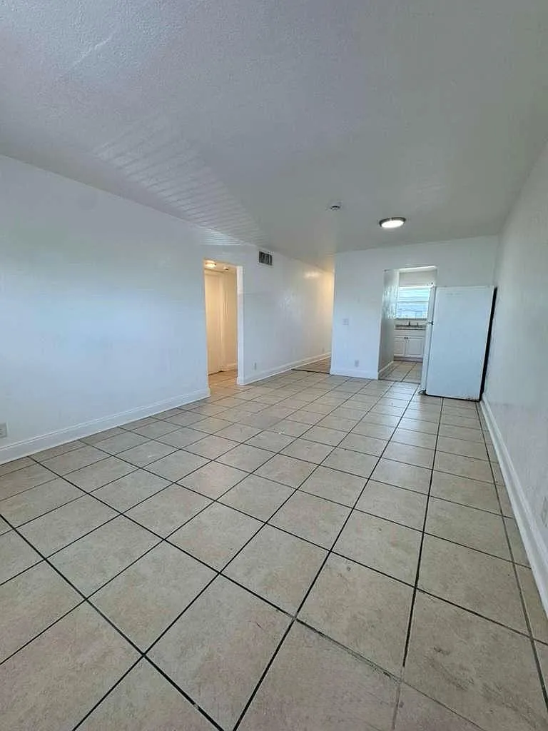 Building Photo - 3375 Avenue J #9