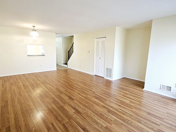 Huge Living and Dining area- well lit with elegant flooring, ample storage and easy access to kitchen