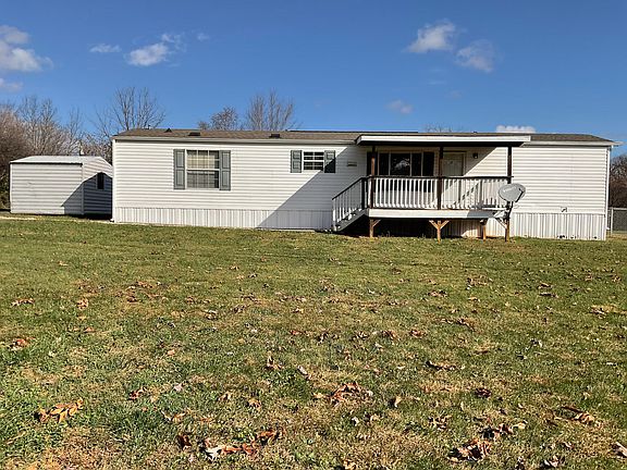 FRONT LAWN VIEW FROM STREET WITH STORAGE BUILDING