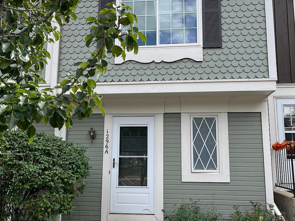 There is a beautiful burning bush to the left of the front door that is a stunning red color in the fall.