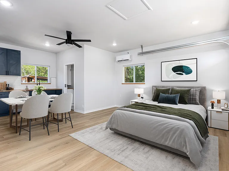 Airy and expansive guest house allows for easy configuration of furniture to suit your needs.