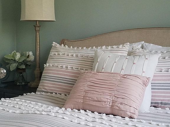 A Cozy down comforter and goose feather pillows compliment the high end luxury hotel mattress for the best nights sleep.