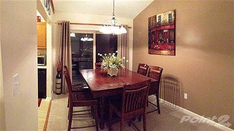Dining area boasts updated lighting and walkout to deck.  Perfect for entertaining!
