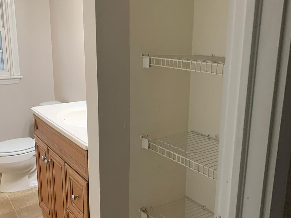 Bathroom with linen closet