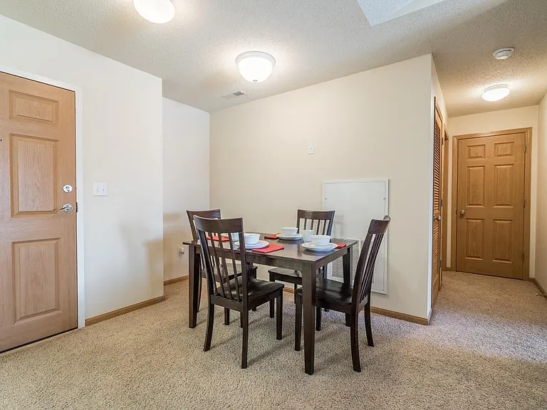 Enjoy meals in a cozy dining space perfect for gatherings.