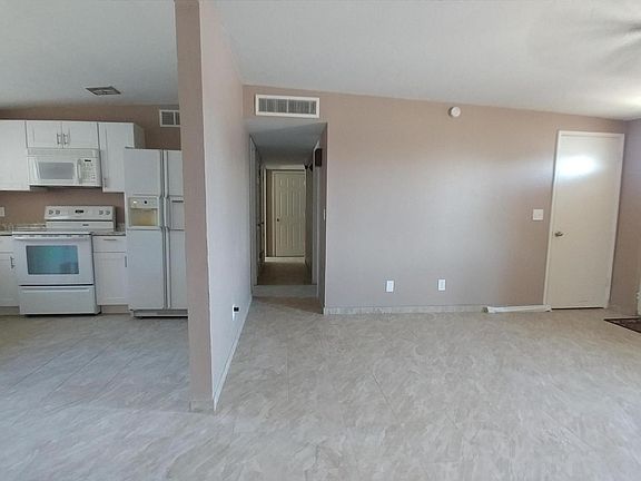 Living room and kitchen.