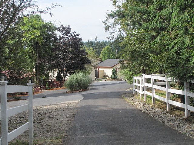 drivway, RV pad on left