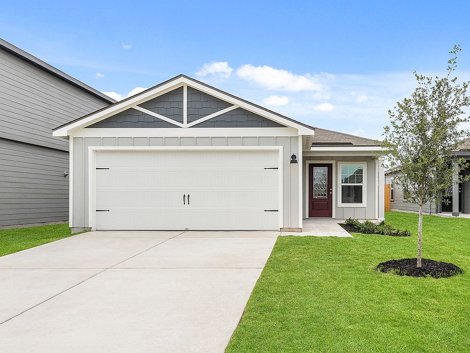 Exterior of the Hawthorne with a two-car garage.