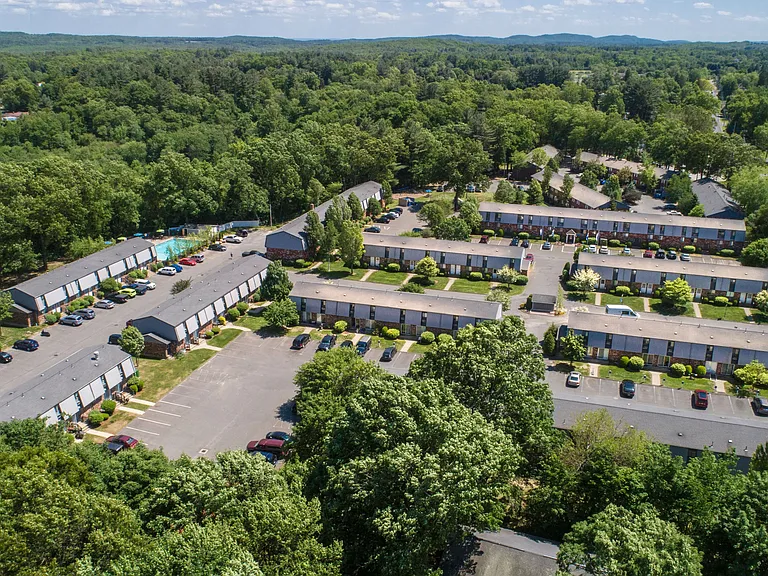 Discover Southwood Acres from a bird's eye view, a serene and private community nestled amid lush trees. Welcome home to nature's embrace.