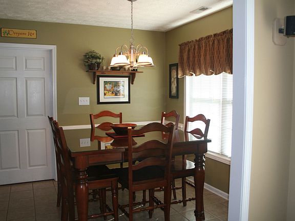 Dining Area in kitchen with ceranmic tile floors