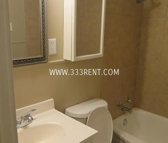 807 E 100th Ter — Photo 13