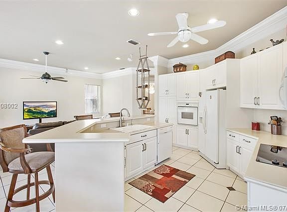 Open Contemporary Kitchen overlooking Family Room
