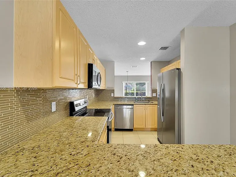 9840 NW 19th Pl — Photo 3