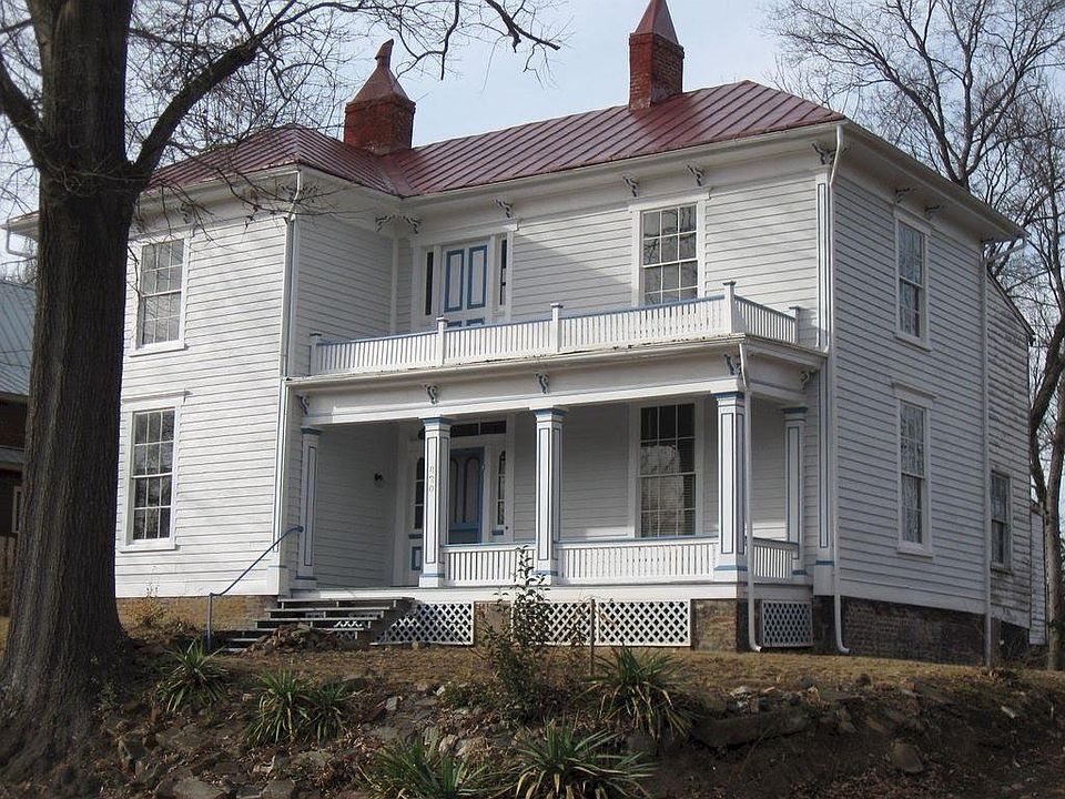 Long driveway to the right of the house