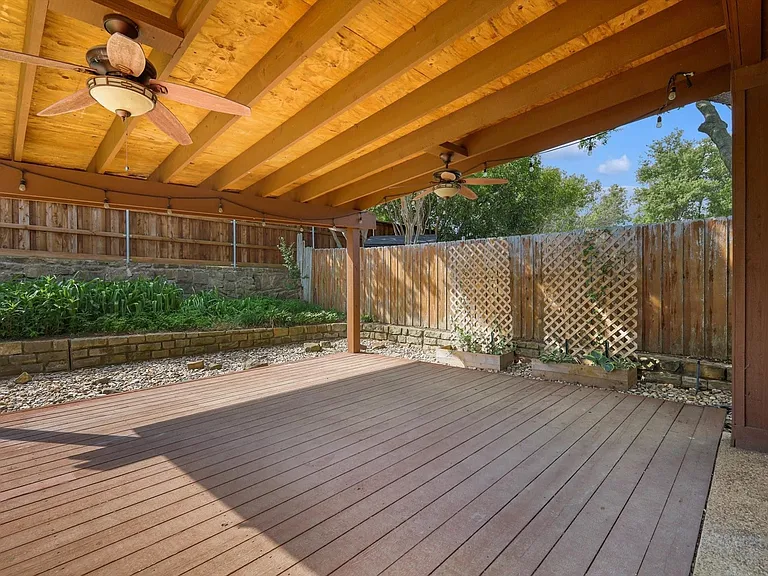 Spacious covered patio with fans
