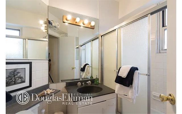 Sold by Douglas Elliman | media 12