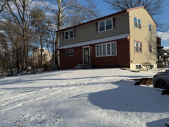 Front of house with front yard