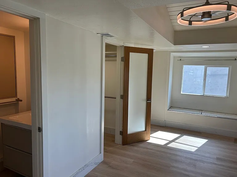 Walking closet and full bathroom in the master bedroom.