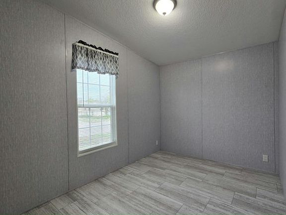 5th image of 1219 51st Ave E Lot 9