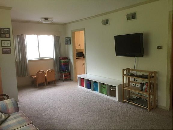 Living room area (photo 1/3) -updated berber carpet, and lots of natural light.