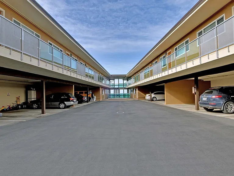 Covered parking available and central walkway