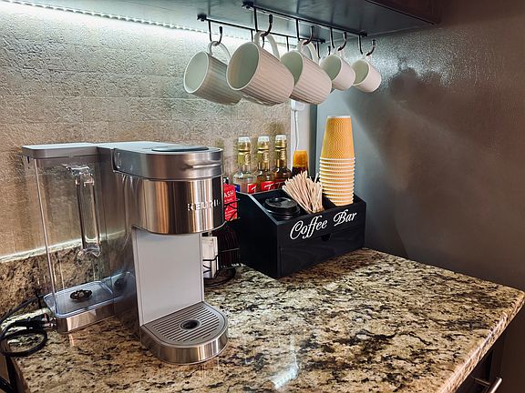 Coffee + tea station with starter items.