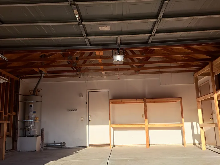 Garage, entry door to interior of home