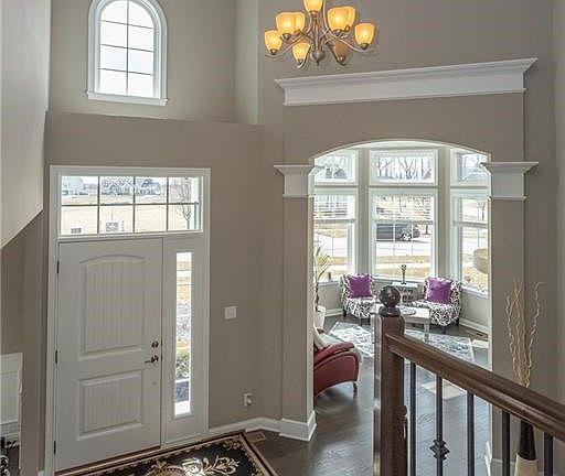 Gorgeous entry, with front entry to the staircase.  There's a second entry to the staircase from the family room/kitchen area.