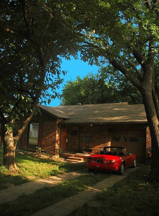 Luscious, mature shade trees in front and back.