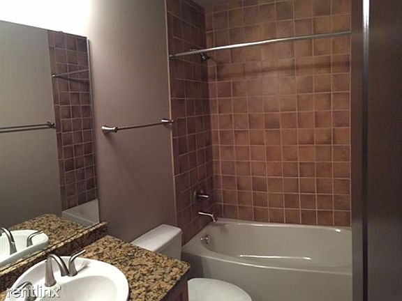 Tiled showers and upgraded counter tops in bathrooms