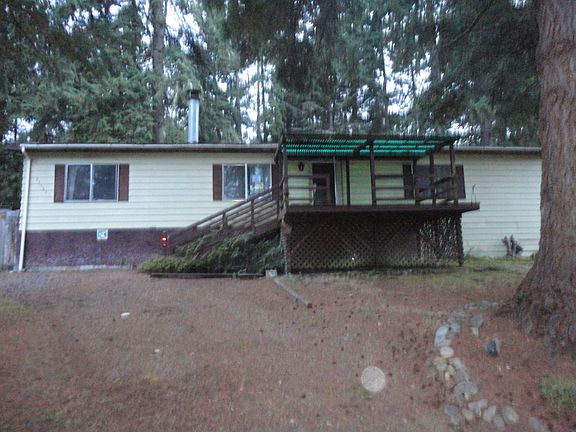 Lap siding and a composition roof
