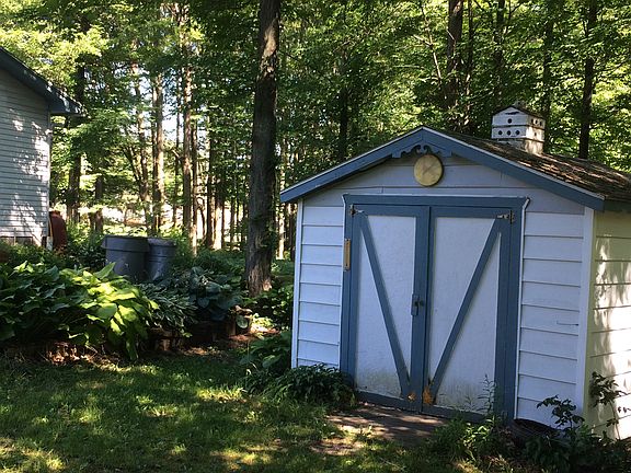 large custom built wood shed