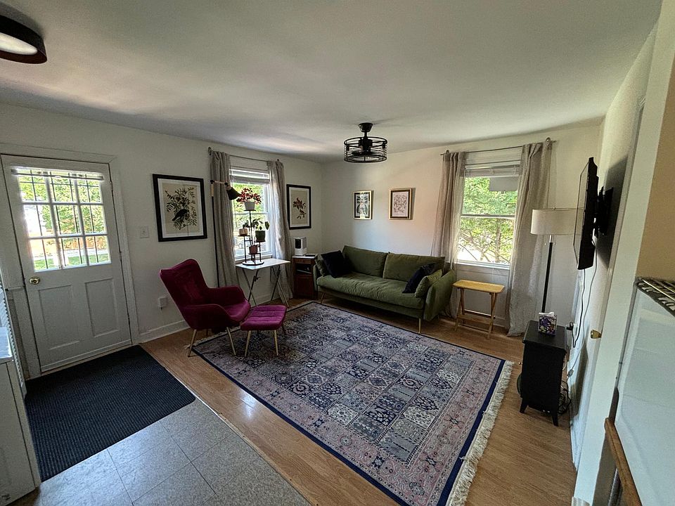 Sunny living room with integrated kitchen