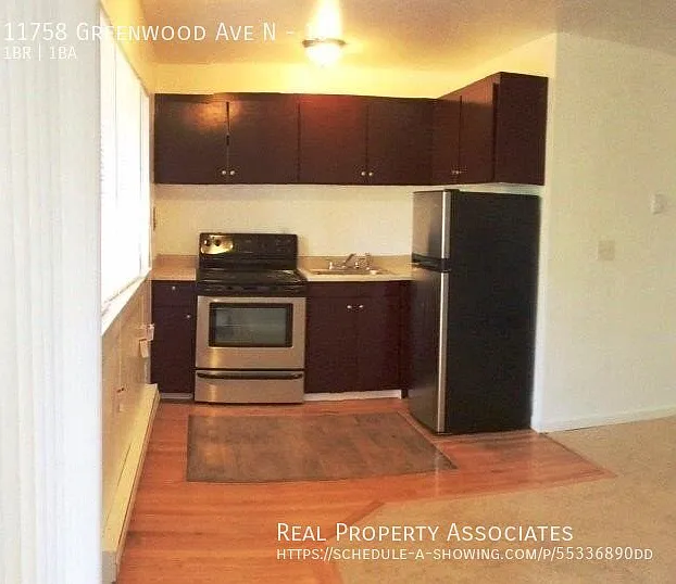 Ground Floor Corner One Bedroom Apartment with a Balcony Deck — Photo 3