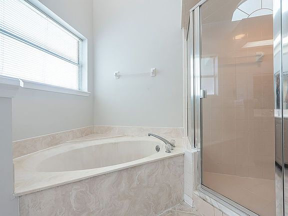 Tub with separate shower
