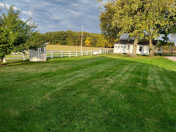 Plentiful pretty back yard with views of nature