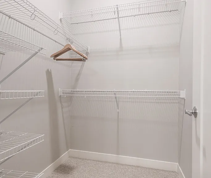 Large walk-in closets offer plenty of space to keep your wardrobe organized.