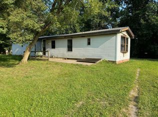 701 Parkwood Dr, Six Lakes, MI 48886