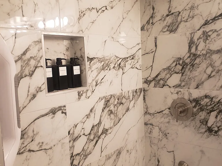 2nd bathroom with new shower over tub.