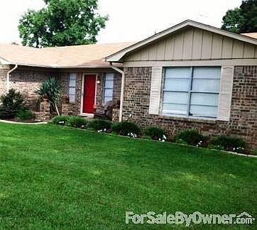 Beautiful, thick green grass. Very nice yard.