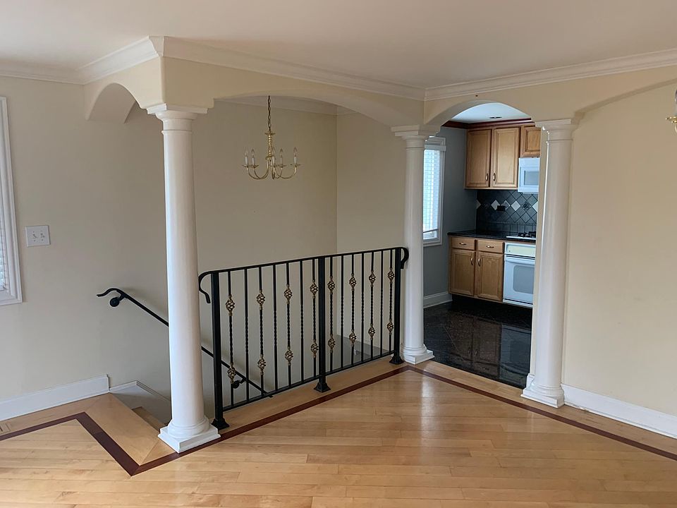 View of Kitchen/Dinning room and stairs to lower floor
