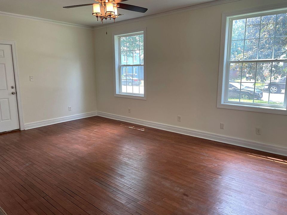 Living Room - add your own window treatments to suit your personal style!