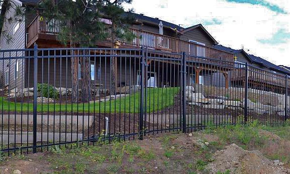 Full width metal fencing.